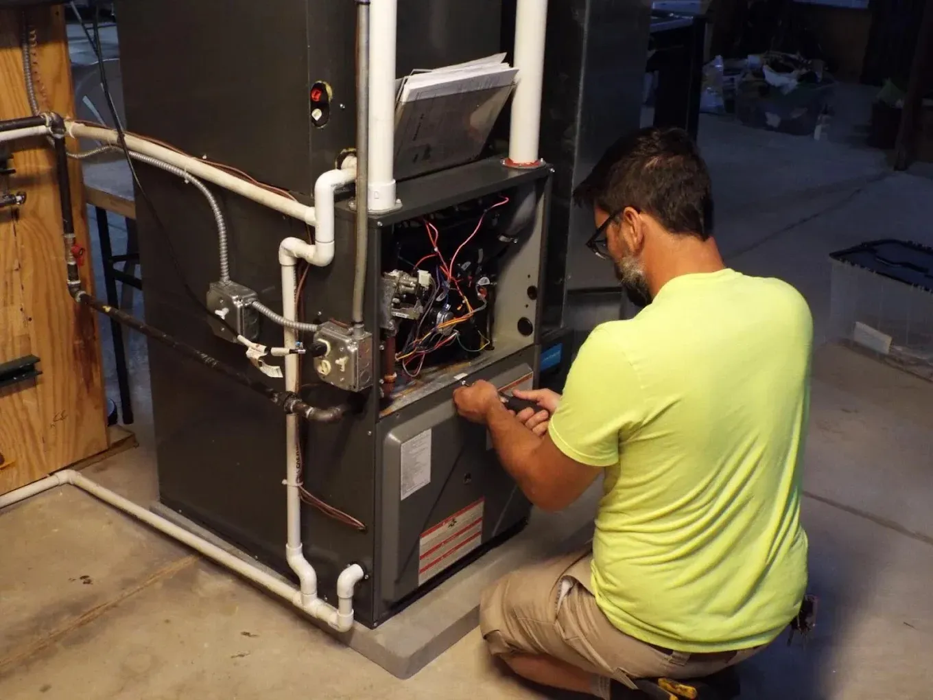 HVAC System Installation for New Residential & Commercial Builds 2 Step-by-step HVAC installation process with technicians assessing and installing systems